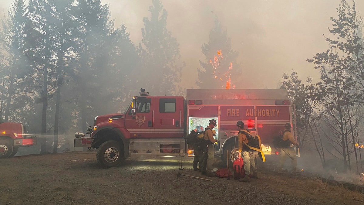 This photo provided by the Unified Fire Authority shows Utah fire crews prepare to fight wildfires near Butte Falls in southern Oregon on Saturday, Sept. 12, 2020. (Matthew McFarland/Unified Fire Authority via AP)