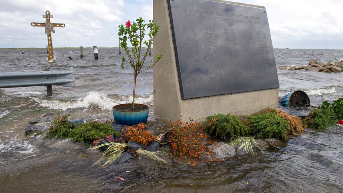 The Hurricane Katrina monument is surrounded by rising water in eastern St. Bernard Parish, La., evacuate for Hurricane Sally on Sept. 14. (Chris Granger/The Advocate via AP)