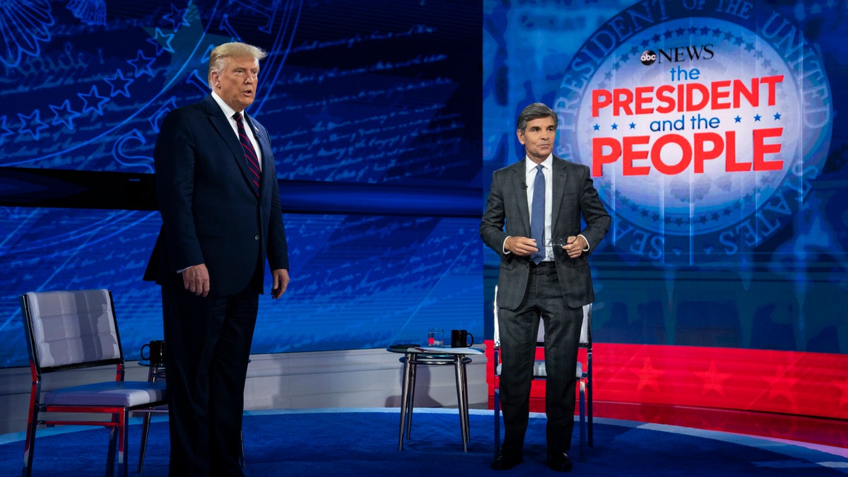 President Trump talks with ABC News anchor George Stephanopoulos before a town hall at National Constitution Center, Sept. 15, 2020, in Philadelphia. (Associated Press)