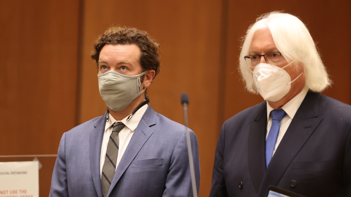 Actor Danny Masterson left, stands with his attorney, Thomas Mesereau as he is arraigned on rape charges at Los Angeles Superior Court, in Los Angeles, Calif. on Friday, Sept. 18, 2020. (Lucy Nicholson/Pool Photo via AP, File)