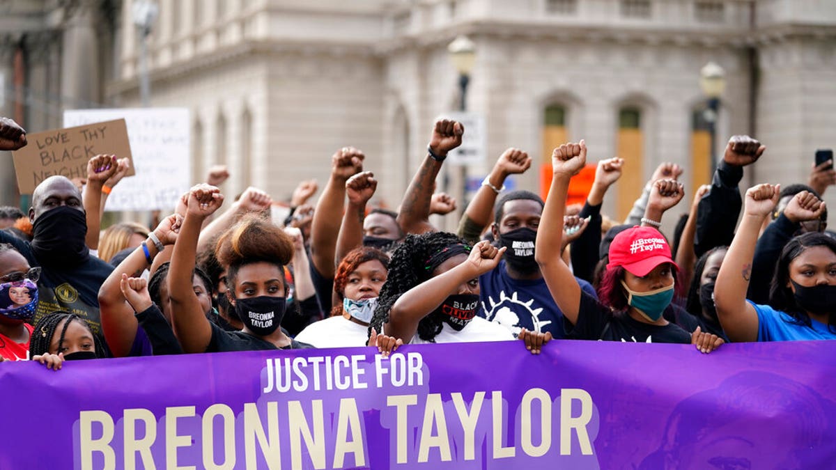 Black Lives Matter protesters march on Sept. 25, 2020, in Louisville, Kentucky.  (AP Photo/Darron Cummings)