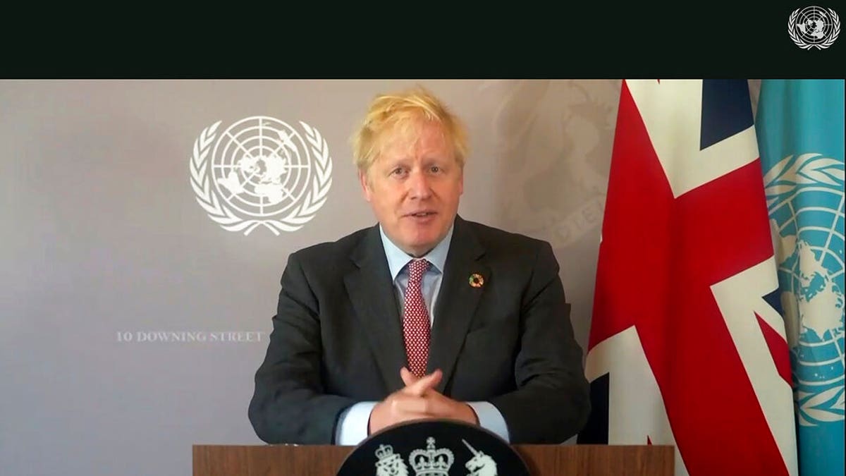 In this photo made from UNTV video, British Prime Minister Boris Johnson speaks in a pre-recorded message which was played during the 75th session of the United Nations General Assembly, Saturday, Sept. 26, 2020, at UN Headquarters. (UNTV Via AP )