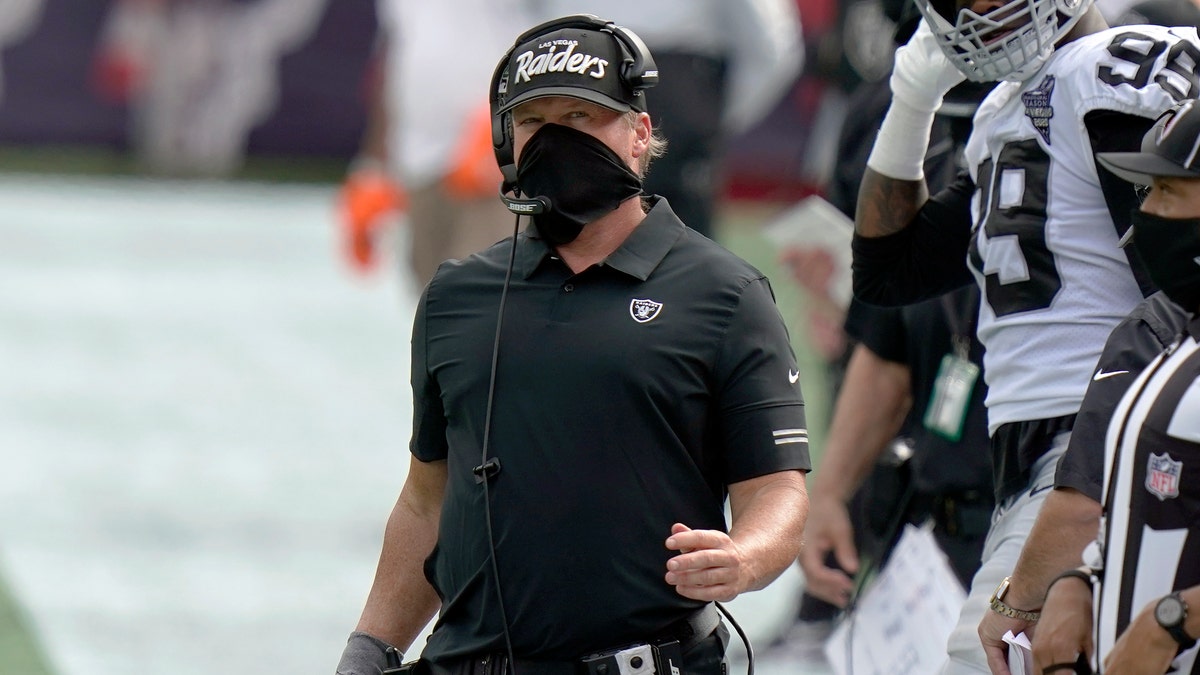 Las Vegas Raiders head coach Jon Gruden works along the sideline in the second half of an NFL football game against the New England Patriots, Sunday, Sept. 27, 2020, in Foxborough, Mass. (AP Photo/Steven Senne)