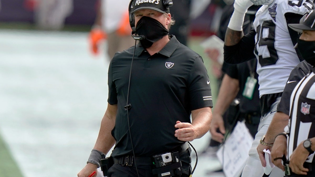 Las Vegas Raiders head coach Jon Gruden works along the sideline in the second half of an NFL football game against the New England Patriots, Sunday, Sept. 27, 2020, in Foxborough, Mass. (AP Photo/Steven Senne)