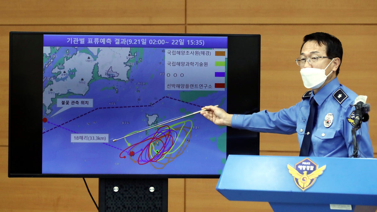 Yoon Seong-hyun, head of the Korea Coast Guard's investigation bureau, speaks during a briefing at the agency in Incheon, South Korea, Tuesday, Sept. 29, 2020. South Korea said Tuesday that a government official slain by North Korean sailors wanted to defect, concluding that the man, who had gambling debts, swam against unfavorable currents with the help of a life jacket and a floatation device and conveyed his intention of resettling in North Korea. (Yun Hyun-tae/Yonhap via AP)