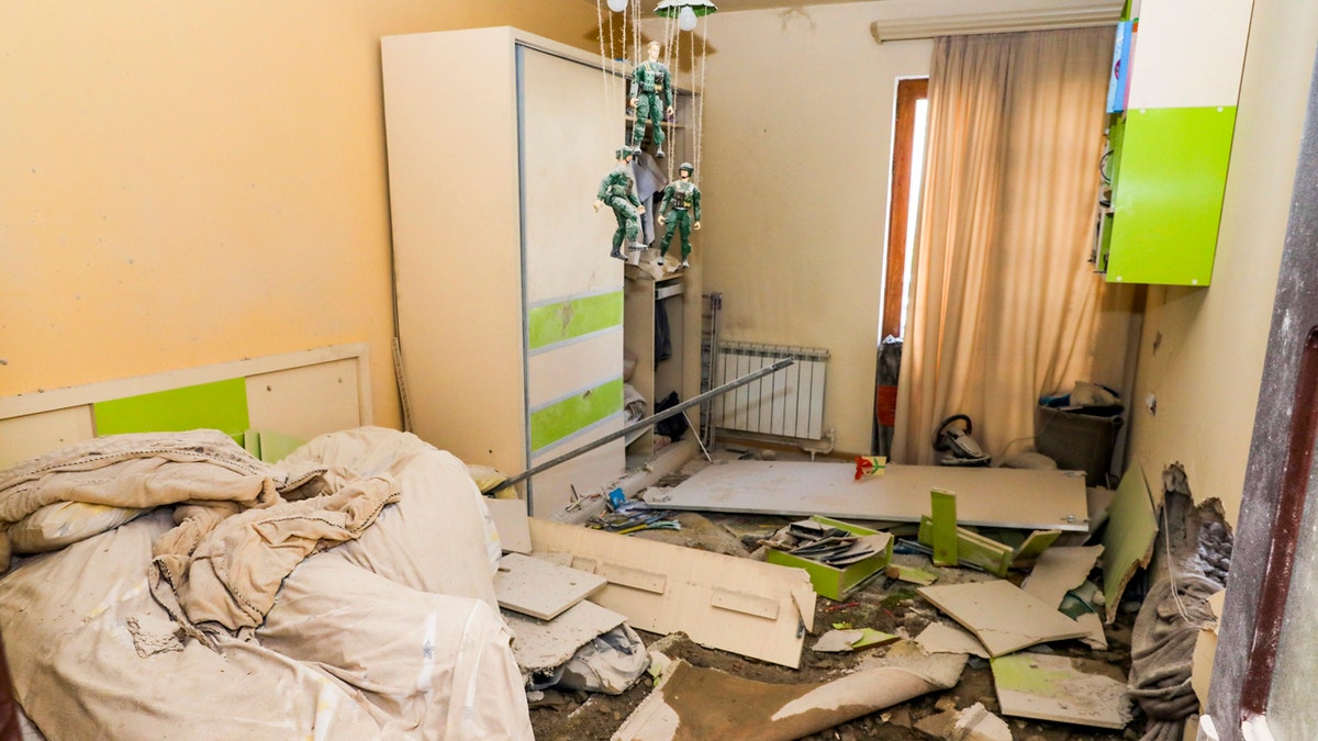 This handout photo released by Armenian Foreign Ministry on Sunday, Sept. 27, 2020, shows a damaged after shelling flat in Stepanakert, the self-proclaimed Republic of Nagorno-Karabakh, Azerbaijan.