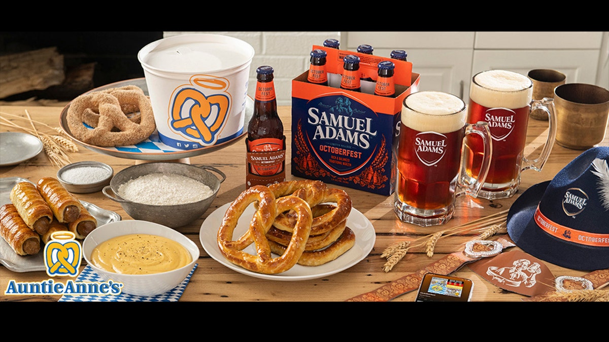 The Oktoberfest At Home Kit includes a six-pack of Samuel Adams beer, a DIY pretzel kit from Auntie Anne's, party hats and lederhosen suspenders. (PRNewsfoto/Auntie Anne's)