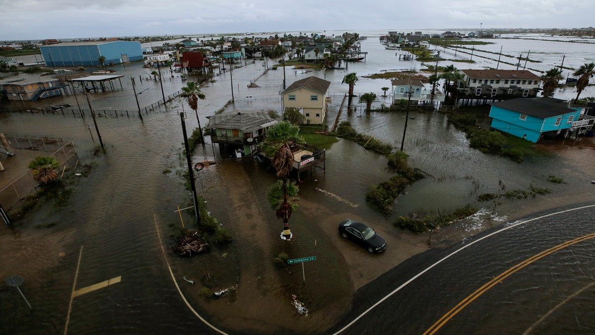 Some roads remain flooded in Surfside Beach, Texas, after Tropical Storm Beta made landfall overnight, on Tuesday, Sept. 22, 2020.