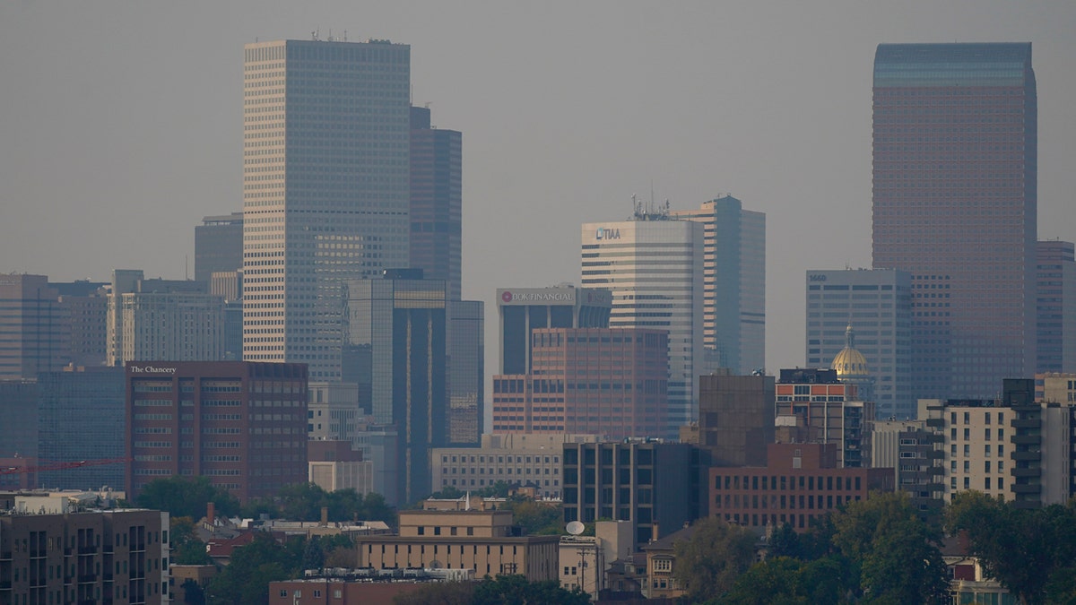 Smoke from several wildfires envelops the Denver skyline on Saturday, Sept. 26, 2020.