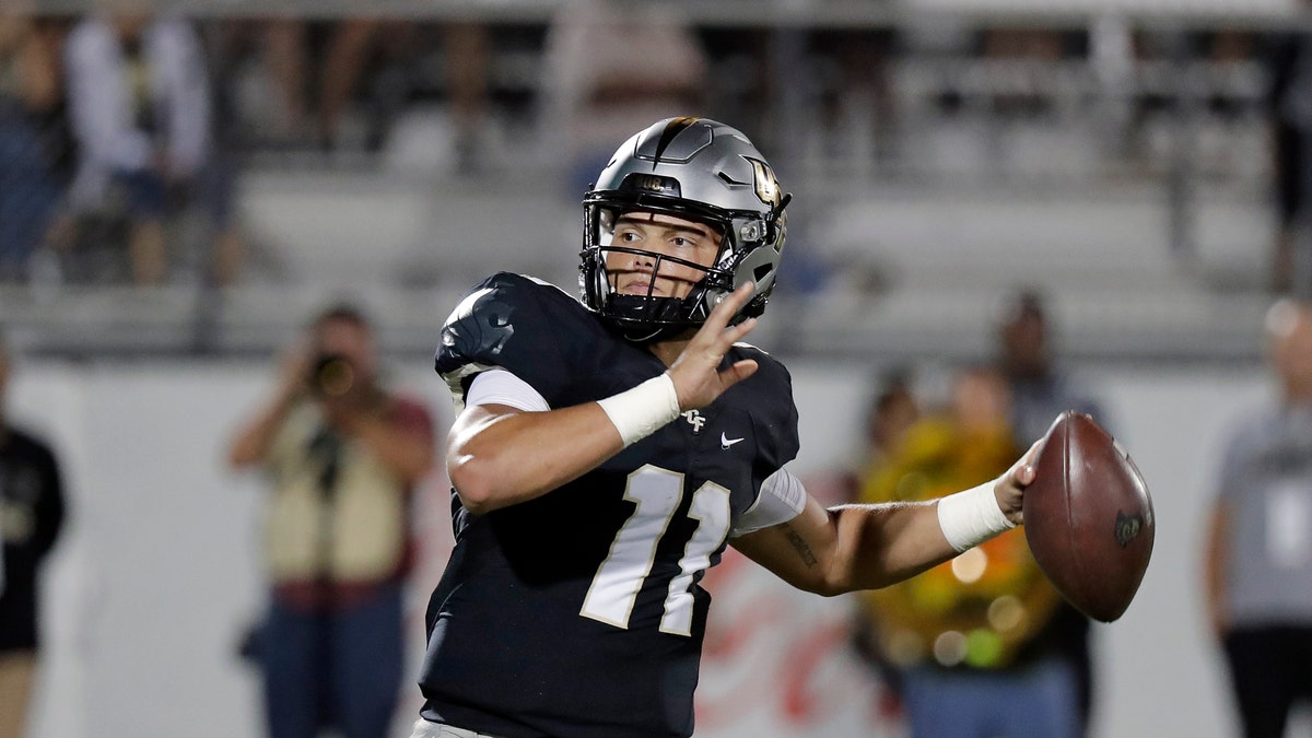 Central Florida quarterback Dillon Gabriel looks for a receiver during the second half of an NCAA college football game against East Carolina, Saturday, Oct. 19, 2019, in Orlando, Fla. Gabriel and the 13th-ranked Knights open American Athletic Conference play on the road Saturday at East Carolina. (AP Photo/John Raoux)