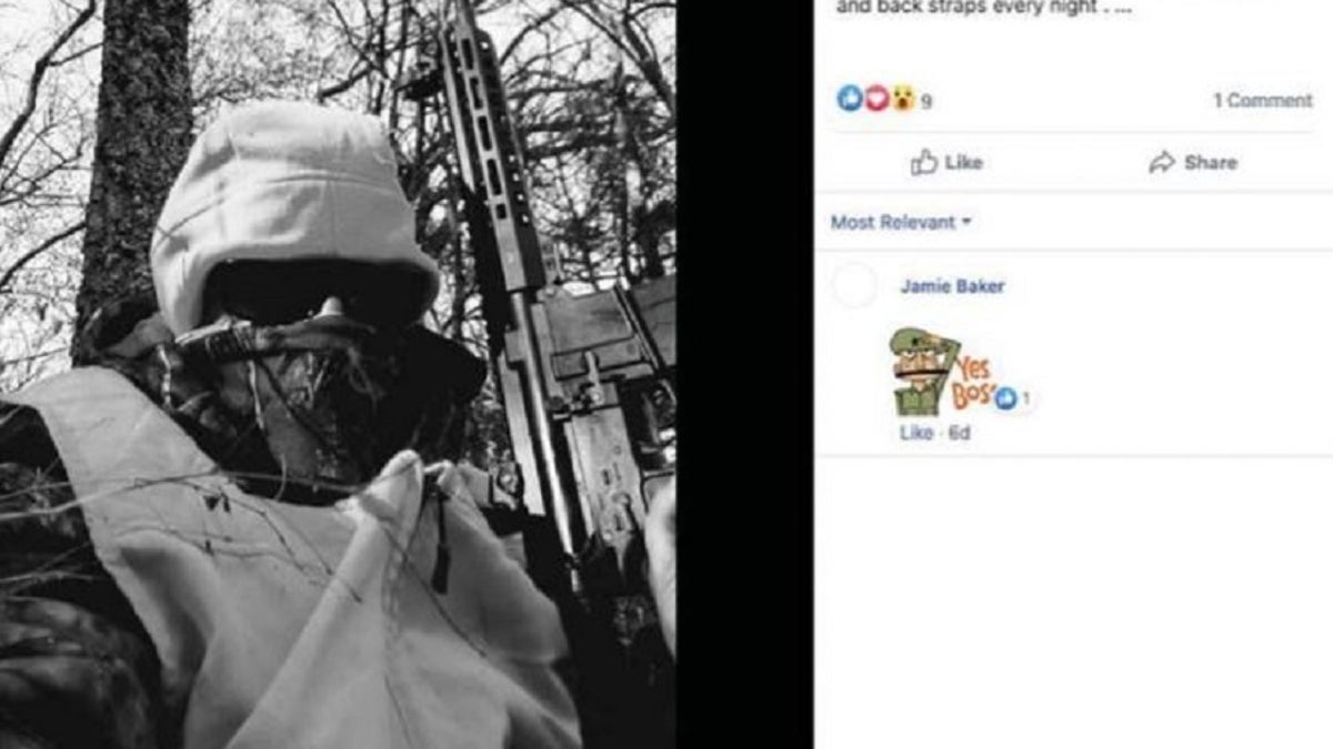 A Facebook screenshot shows Michael Karmo posing with a rifle, according to the Justice Department. Karmo and Cody Smith were arrested for illegal weapons possession. The pair drove from Missouri to Kenosha, Wis., and were found with weapons and ammunition Tuesday.