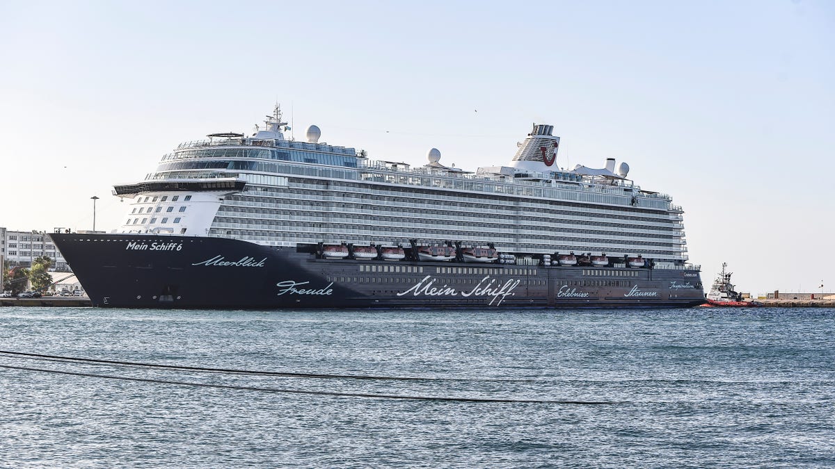 The Mein Schiff 6 cruise ship is docked at Piraeus port, near Athens on Tuesday, Sept. 29. Greek authorities say 12 crew members on a Maltese-flagged cruise ship carrying more than 1,500 people on a Greek islands tour have tested positive for coronavirus and have been isolated on board. (Dimitris Lampropoulos/NurPhoto via Getty Images)