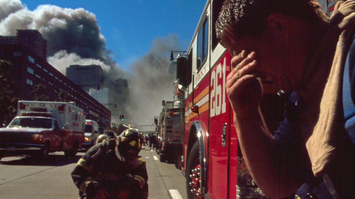 Colour photograph of a New York Fire-fighter amid the rubble of the World Trade Centre following the 9/11 attacks. Dated 2001. (Universal History Archive/Universal Images Group via Getty Images)