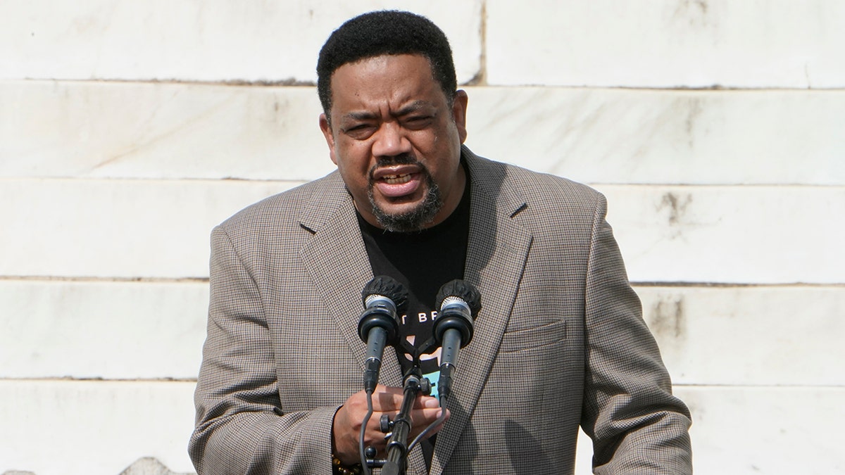Bishop Talbert Swan, III speaks at the Lincoln Memorial during the "Commitment March: Get Your Knee Off Our Necks" protest against racism and police brutality, on August 28, 2020, in Washington DC. (Photo by JACQUELYN MARTIN/POOL/AFP via Getty Images)