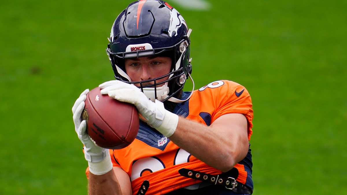 Denver Broncos tight end Jake Butt takes part in drills during an NFL football practice in empty Empower Field at Mile High, Saturday, Aug. 29, 2020, in Denver. (AP Photo/David Zalubowski)