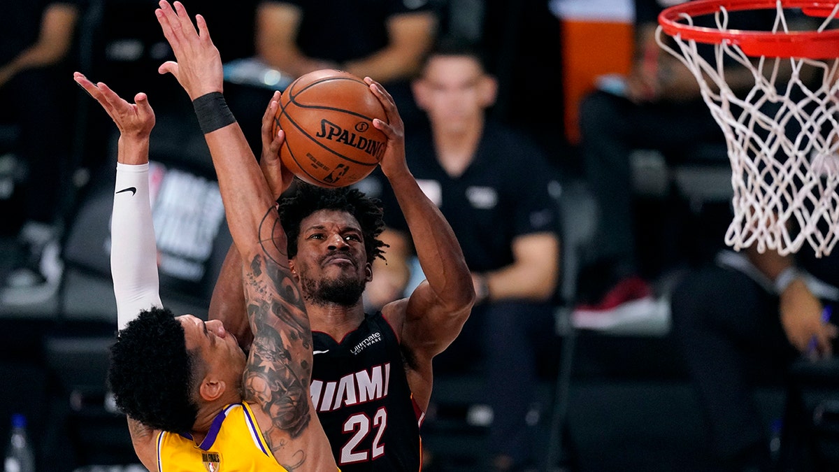 Miami Heat's Jimmy Butler twisted his ankle in the game. (AP Photo/Mark J. Terrill)