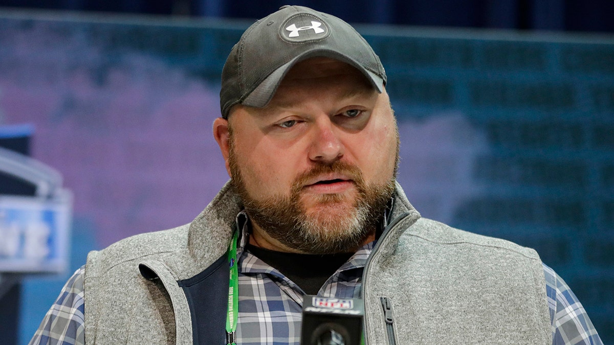 Joe Douglas says he made several moves to help the team get better, but he knows they're still very much a work in progress. (AP Photo/Michael Conroy, File)