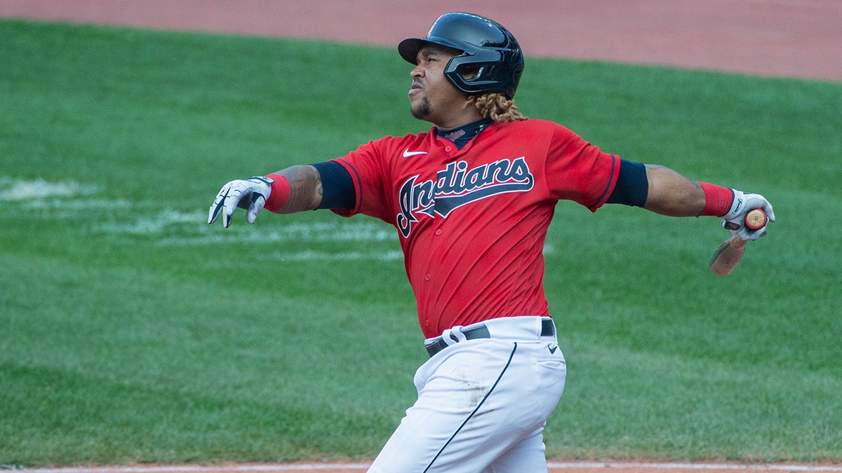 Cleveland Indians' Jose Ramirez watches his double off Pittsburgh Pirates relief pitcher Nik Turley during the seventh inning of a baseball game in Cleveland, Sunday, Sept. 27, 2020. (AP Photo/Phil Long)