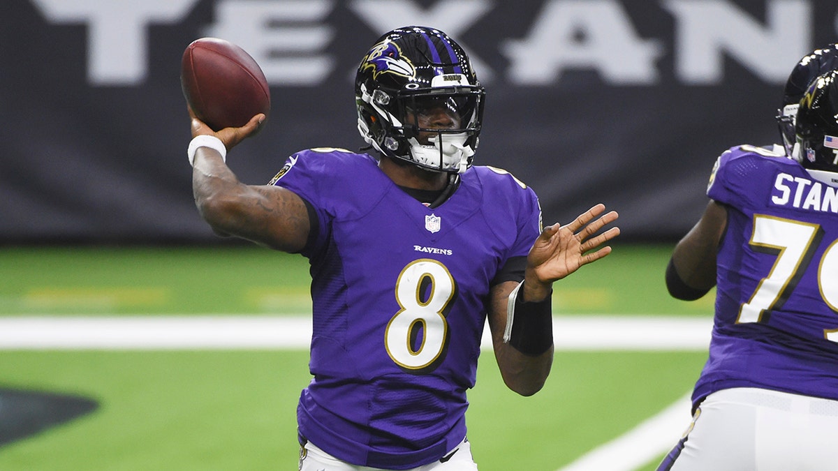 Baltimore Ravens quarterback Lamar Jackson (8) throws against the Houston Texans during the first half of an NFL football game Sunday, Sept. 20, 2020, in Houston. (AP Photo/Eric Christian Smith)