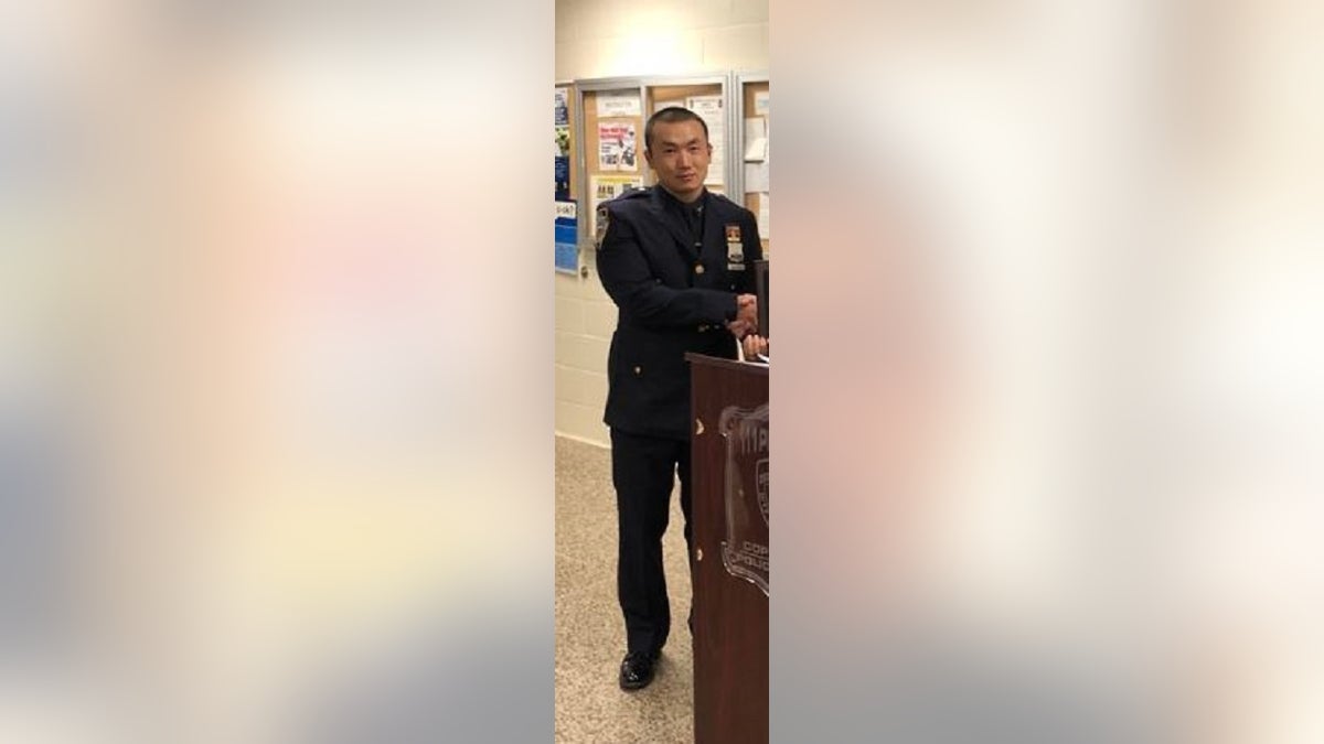New York Police officer Baimadajie Angwang, 33, is accused of working for the Chinese government who agreed to spy on supporters of the free Tibet movement.