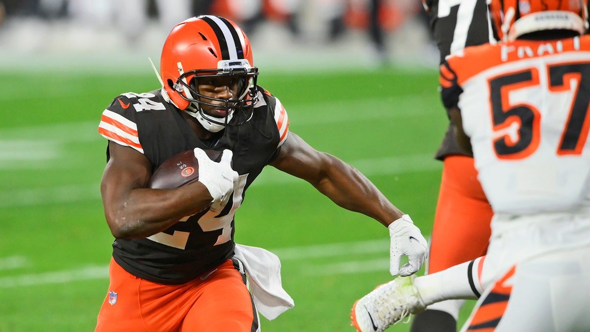 Cleveland Browns running back Nick Chubb rushes for an 11-yard touchdown during the first half of the team's NFL football game against the Cincinnati Bengals, Thursday, Sept. 17, 2020, in Cleveland. (AP Photo/David Richard)