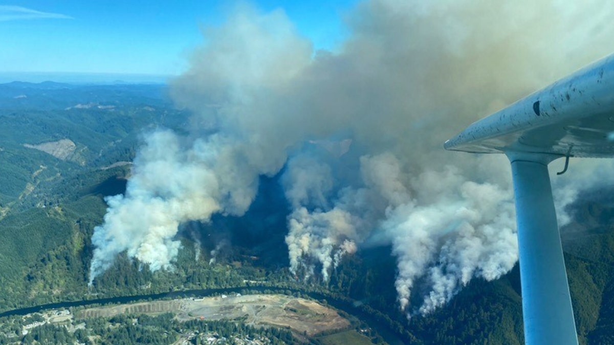 The Sweet Creek Milepost 2 Fire burns in Oregon on Monday, Aug. 31, 2020.