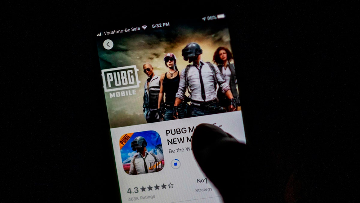 A man looks at the "PUBG Mobile" game, owned by Chinese internet giant Tencent, in the App Store on an Apple iPhone in New Delhi on Sept. 2, 2020. (Jewel SAMAD / AFP) (Photo by JEWEL SAMAD/AFP via Getty Images)