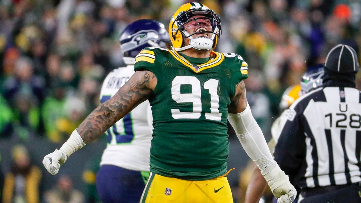 Green Bay Packers' Preston Smith reacts after sacking the Seattle Seahawks' Russell Wilson during the second half of an NFL divisional playoff football game, in Green Bay, Wis. (AP Photo/Matt Ludtke, File)