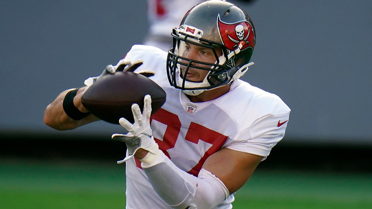 Tampa Bay Buccaneers tight end Rob Gronkowski (87) makes a catch during an NFL football training camp practice Friday, Aug. 28, 2020, in Tampa, Fla. (AP Photo/Chris O'Meara)