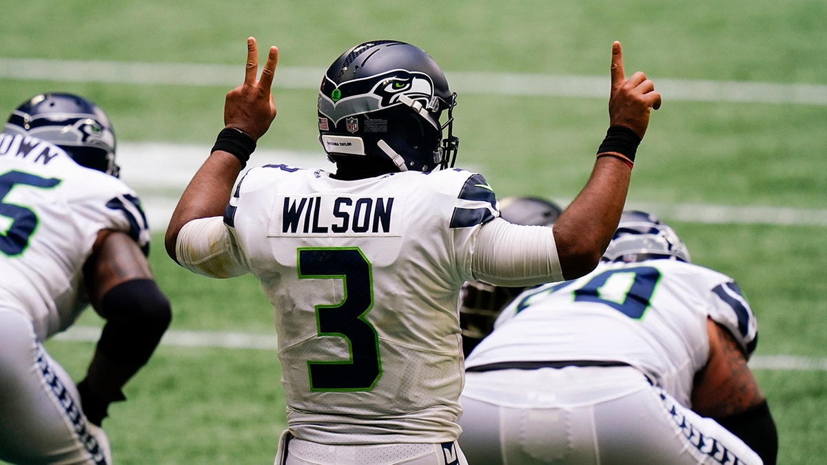 Seattle Seahawks quarterback Russell Wilson (3) calls a play against the Atlanta Falcons during the second half of an NFL football game, Sunday, Sept. 13, 2020, in Atlanta. (AP Photo/Brynn Anderson)