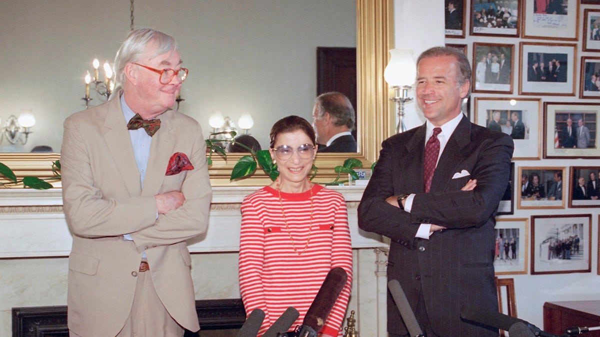 In this June 15, 1993, file photo, Judge Ruth Bader Ginsburg poses with Sen. Daniel Patrick Moynihan, D-N.Y., left, and Sen. Joseph Biden, D-Del., chairman of the Senate Judiciary Committee on Capitol Hill in Washington. 