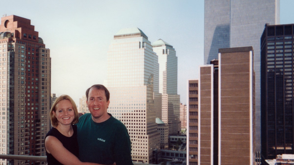Christina Stanton and her husband Brian on their apartment terrace with the Twin Towers in the background just two weeks before the 9/11 terror attacks. Courtesy: Christina Stanton