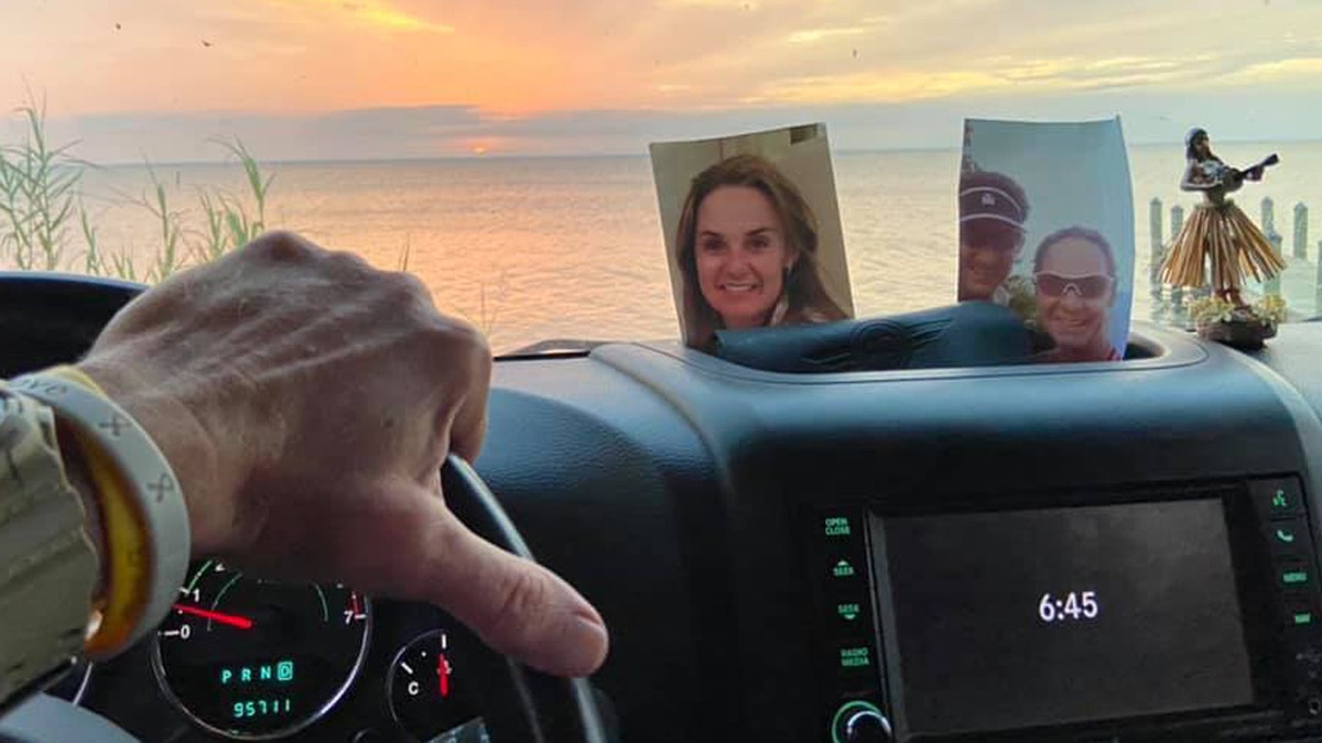 Scott Christmas had kept the photo of his late wife, Amy, on the dashboard of the Jeep for three years before lingering winds from Hurricane Sally blew it out of the vehicle.