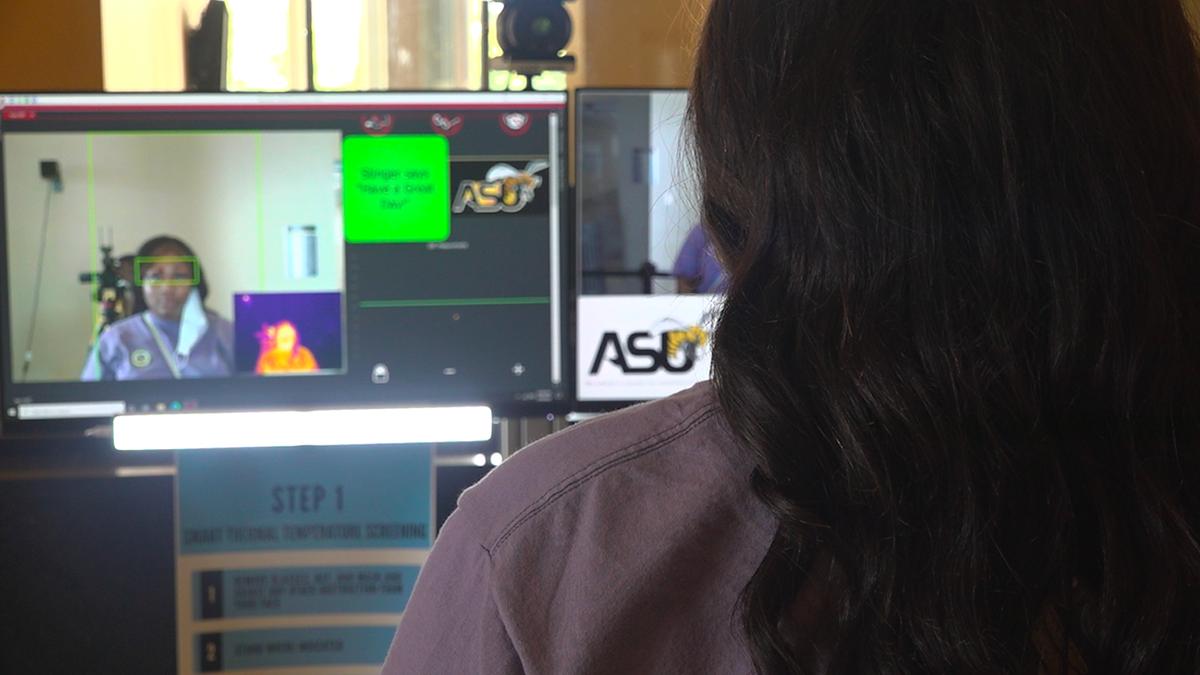 One machine checks students' vitals and temperature before entering classrooms.
