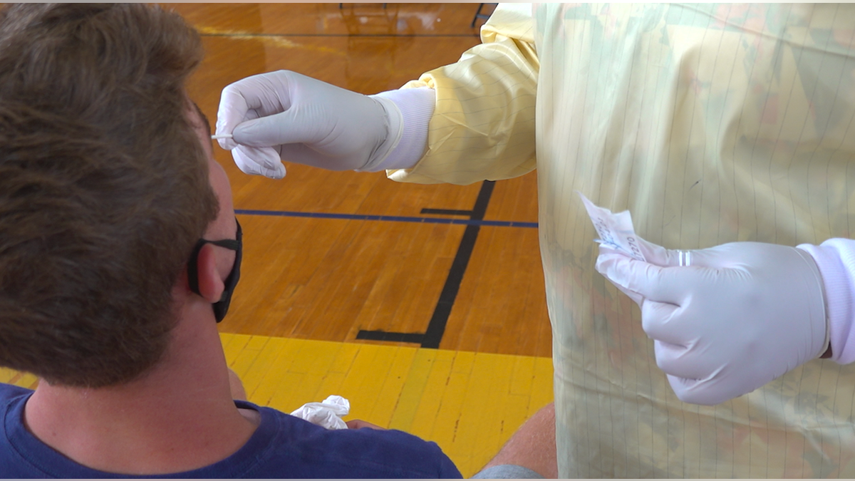 An Alabama State University student receiving a COVID-19 test.