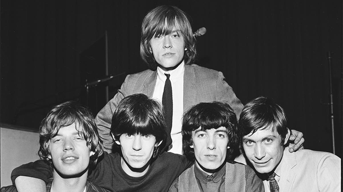 Group portrait of the Rolling Stones circa 1964. L-R Mick Jagger, Keith Richards, Brian Jones (back), Bill Wyman, Charlie Watts. (Photo by Stanley Bielecki/ASP/Getty Images)