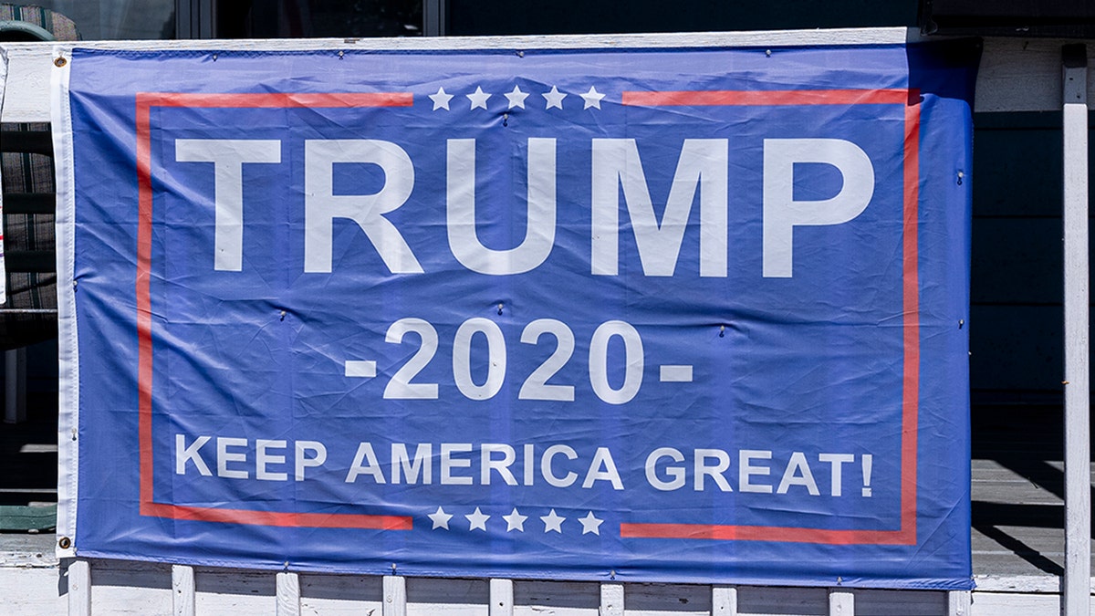 A "Trump 2020" campaign flag attached to a railing Sept. 11, in Scranton, Pa. (Photo by Robert Nickelsberg/Getty Images)