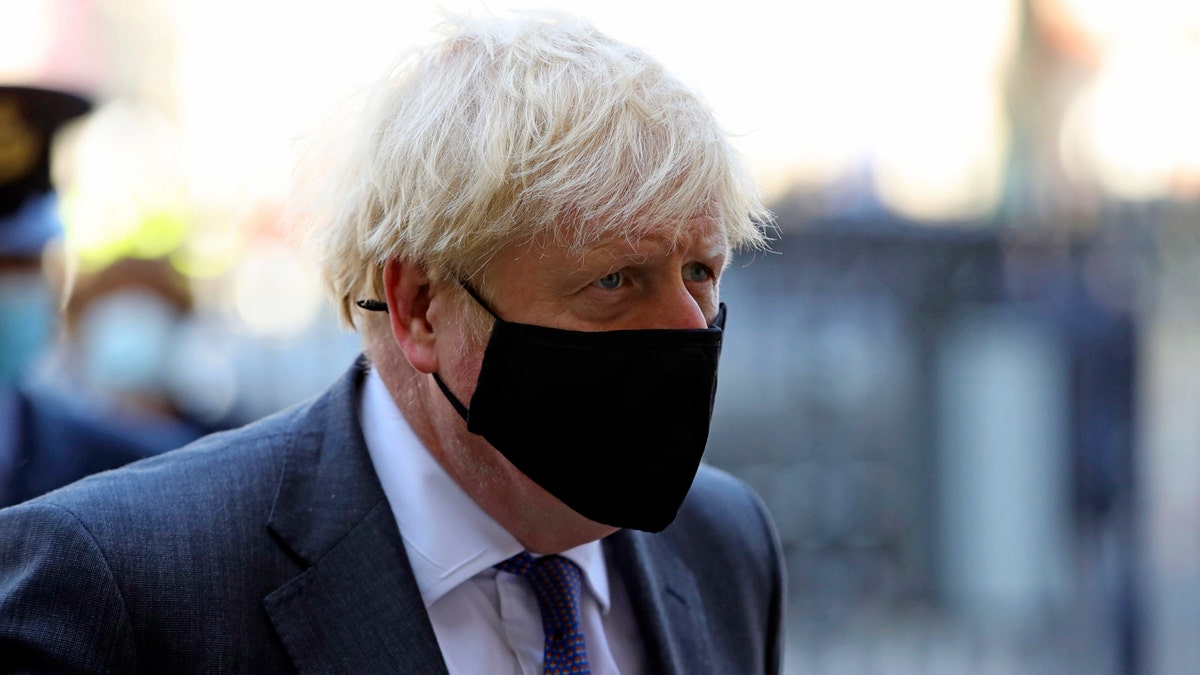 Britain's Prime Minister Boris Johnson arrives for a service to mark the 80th anniversary of the Battle of Britain at Westminster Abbey, London, Sunday, Sept. 20, 2020.