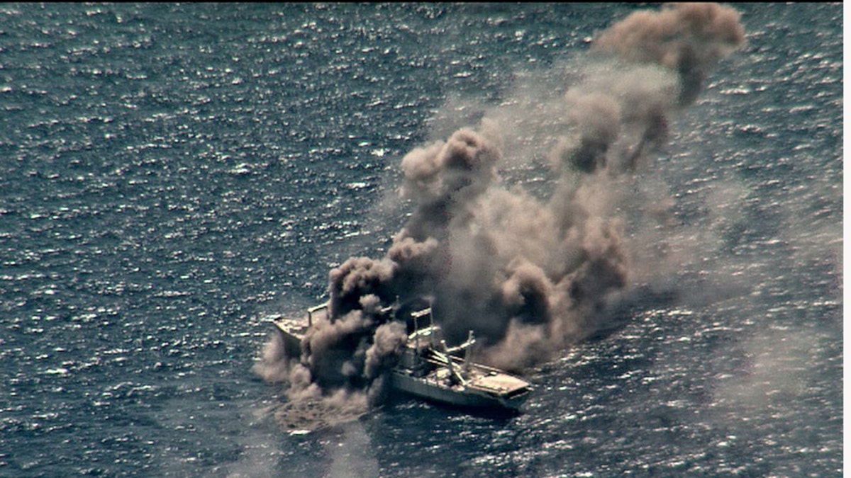 200830-N-NO842-1001 PACIFIC OCEAN (Aug. 30, 2020) Live fire from ships and aircraft participating in the Rim of the Pacific (RIMPAC) exercise sink the decommissioned amphibious cargo ship ex-USS Durham (LKA 114) August 30. (U.S. Navy courtesy photo)