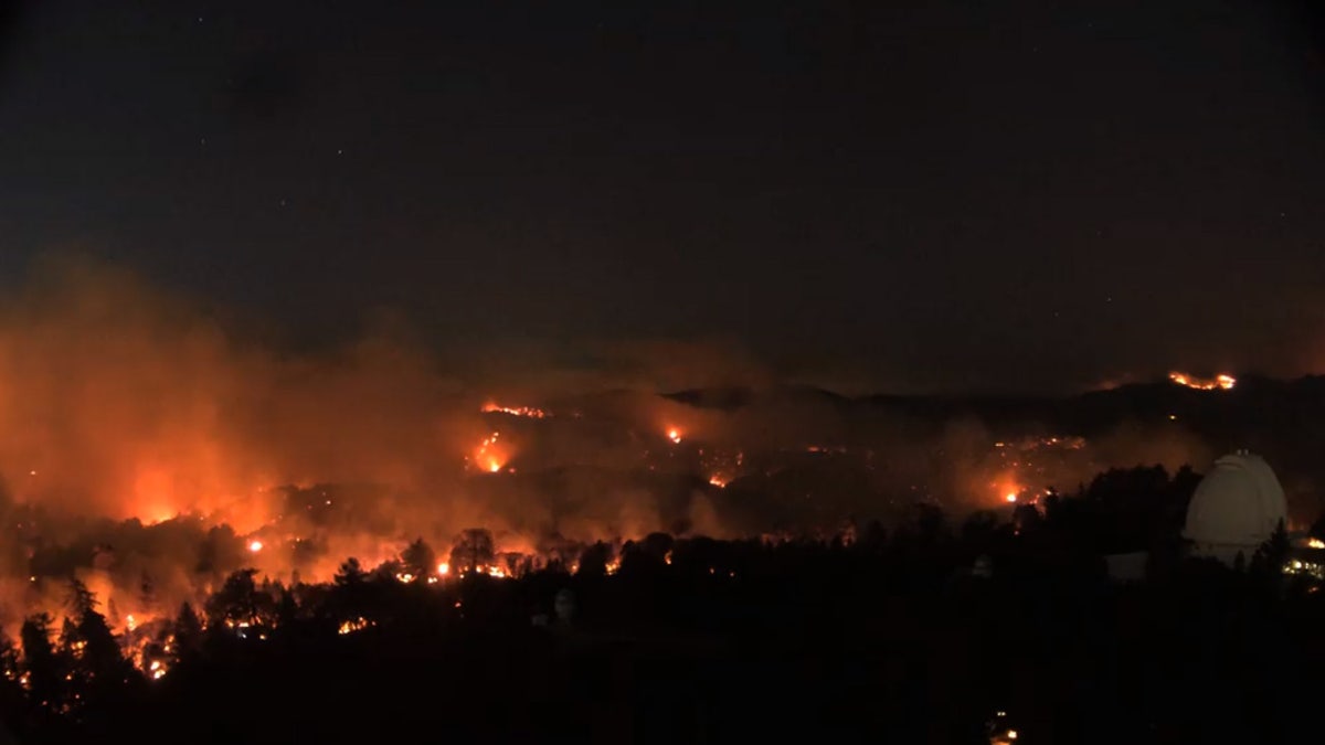 Flames can be seen nearing the Mount Wilson Observatory on Monday, Sept. 21, 2020.