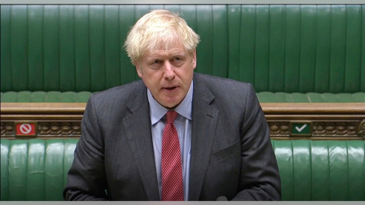 FILE - in this September file photo, British Prime Minister Boris Johnson, shown here speaking in the House of Commons announcing new coronavirus prevention restrictions. (AP/House of Commons)