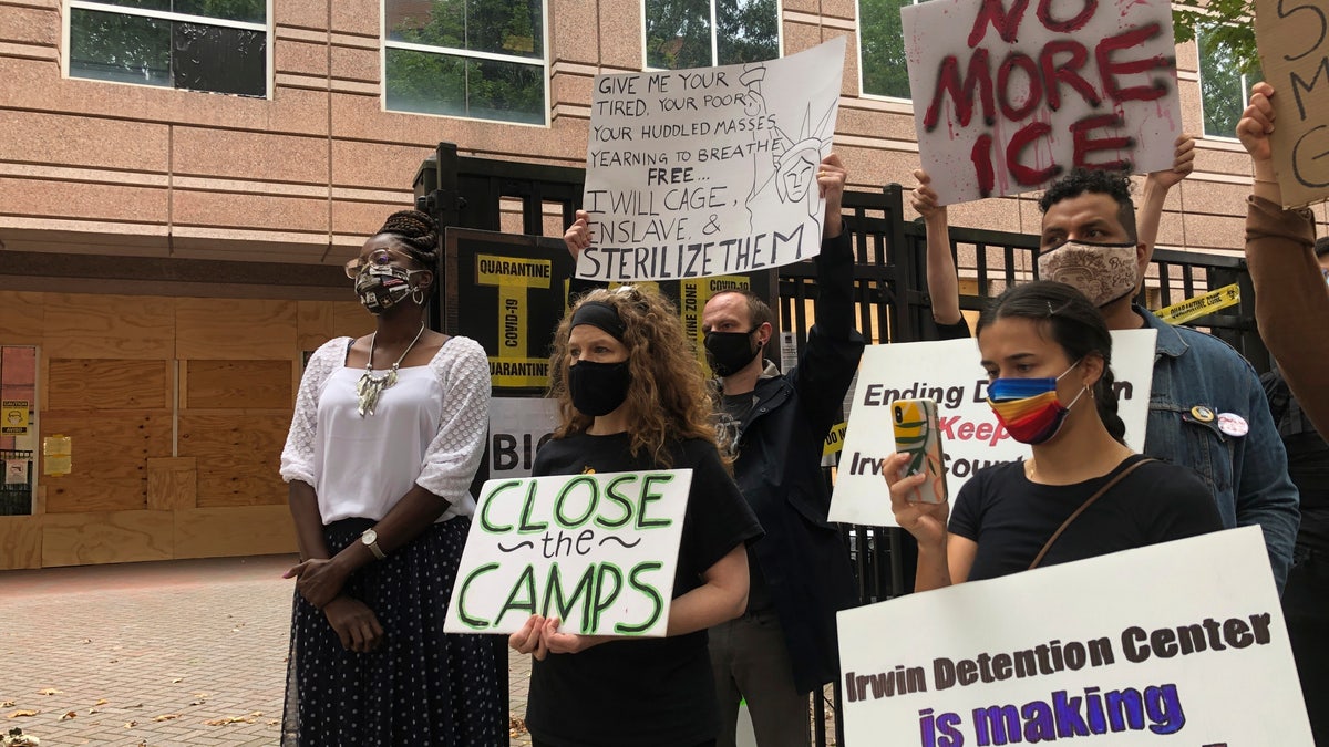 Dawn Wooten, left, a nurse at Irwin County Detention Center in Ocilla, Georgia, speaks at a news conference in Atlanta on Sept. 15 protesting conditions at the immigration jail. (AP)