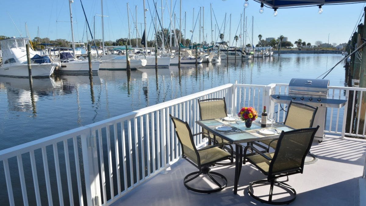 Dreamy amenitites include gorgeous outdoor decks with seating and a gas grill.