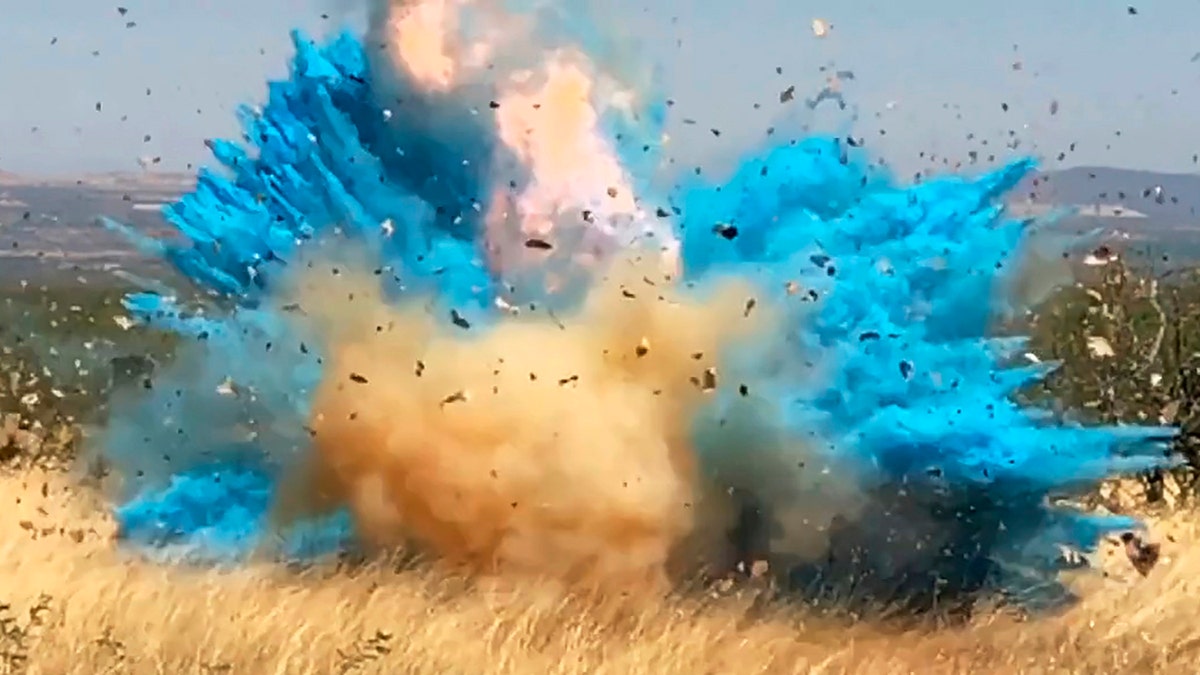 This April 23, 2017, file photo from video provided by the U.S. Forest Service shows a gender reveal event in the Santa Rita Mountain's foothills, southeast of Tucson, Ariz. The explosion from the reveal ignited the 47,000-acre Sawmill Fire.