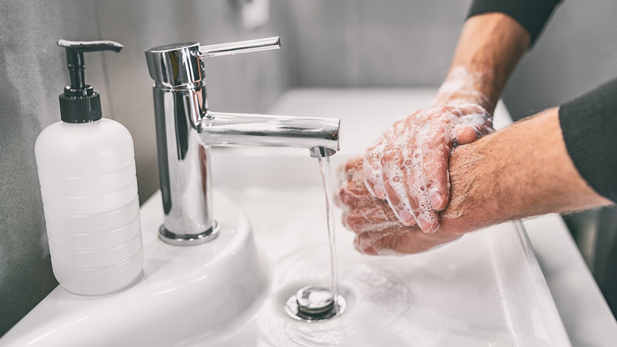 Washing hands rubbing with soap man for coronavirus prevention, hygiene to stop spreading coronavirus. (iStock)