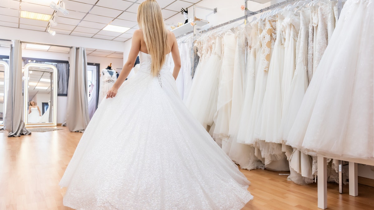 bride in bridal dress shop