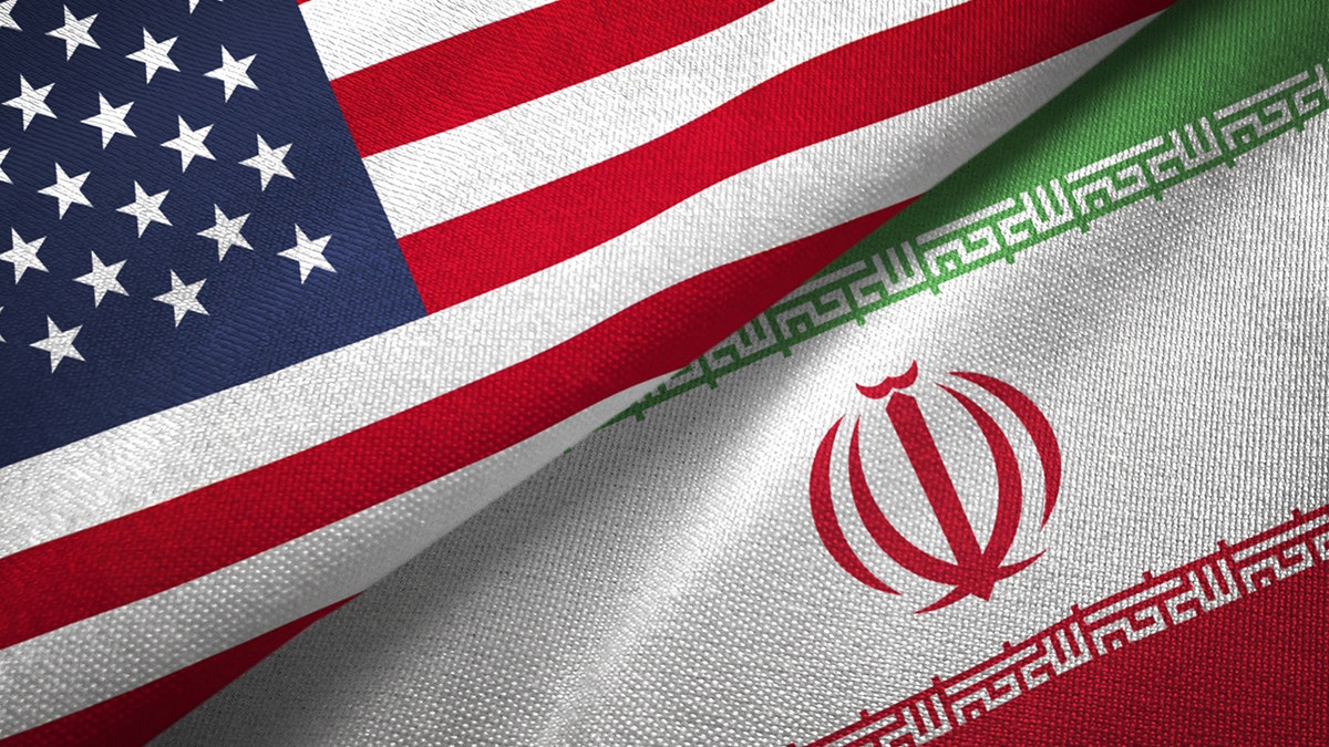 Iran and United States flags together realtions textile cloth fabric texture