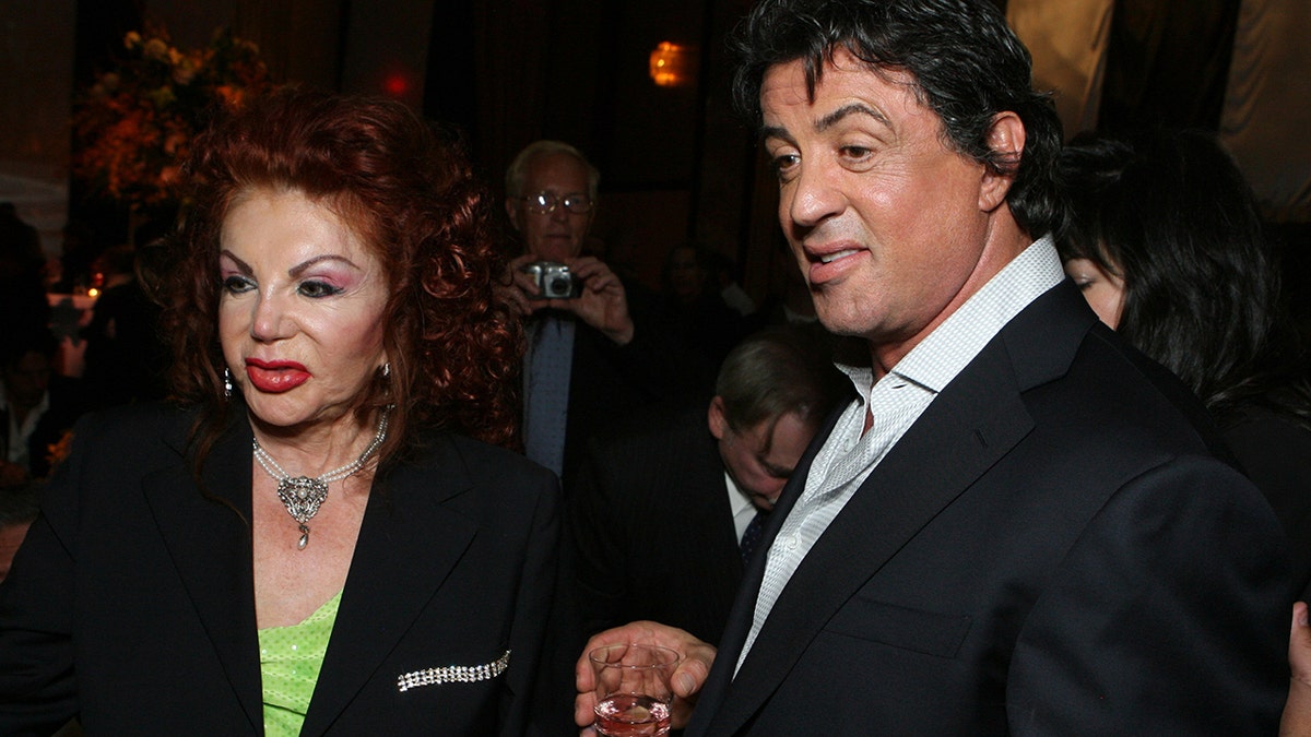 Sylvester Stallone and his mother, Jackie Stallone. She died in her sleep, her son, Frank Stallone announced Monday.