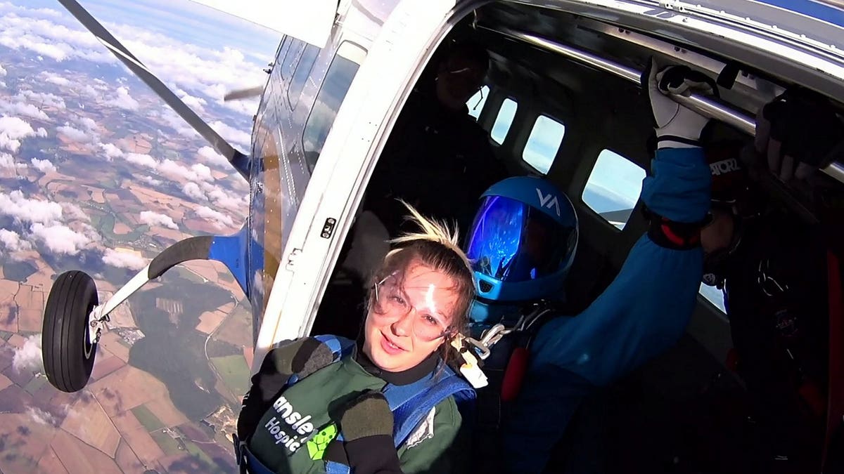 Jason Pack had planned ahead to create the ultimate romantic scene to top his girlfriend Katie Line’s first-ever parachute jump. (SWNS)