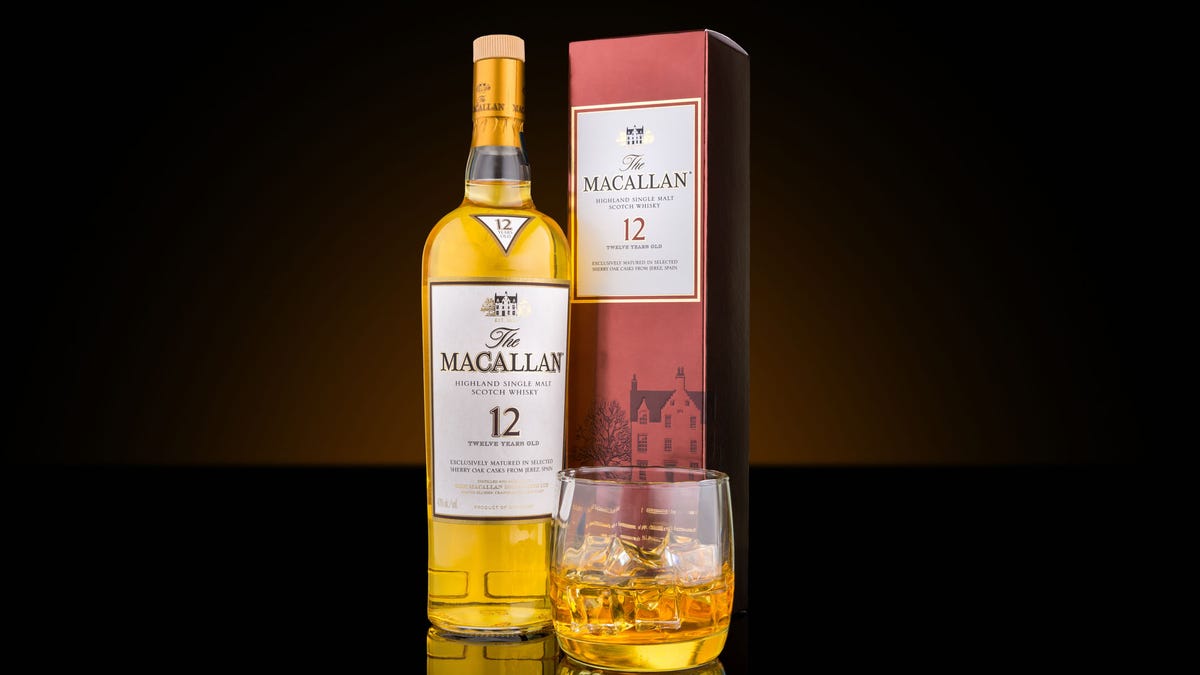 Bottle, case and glass of Macallan single malt whisky